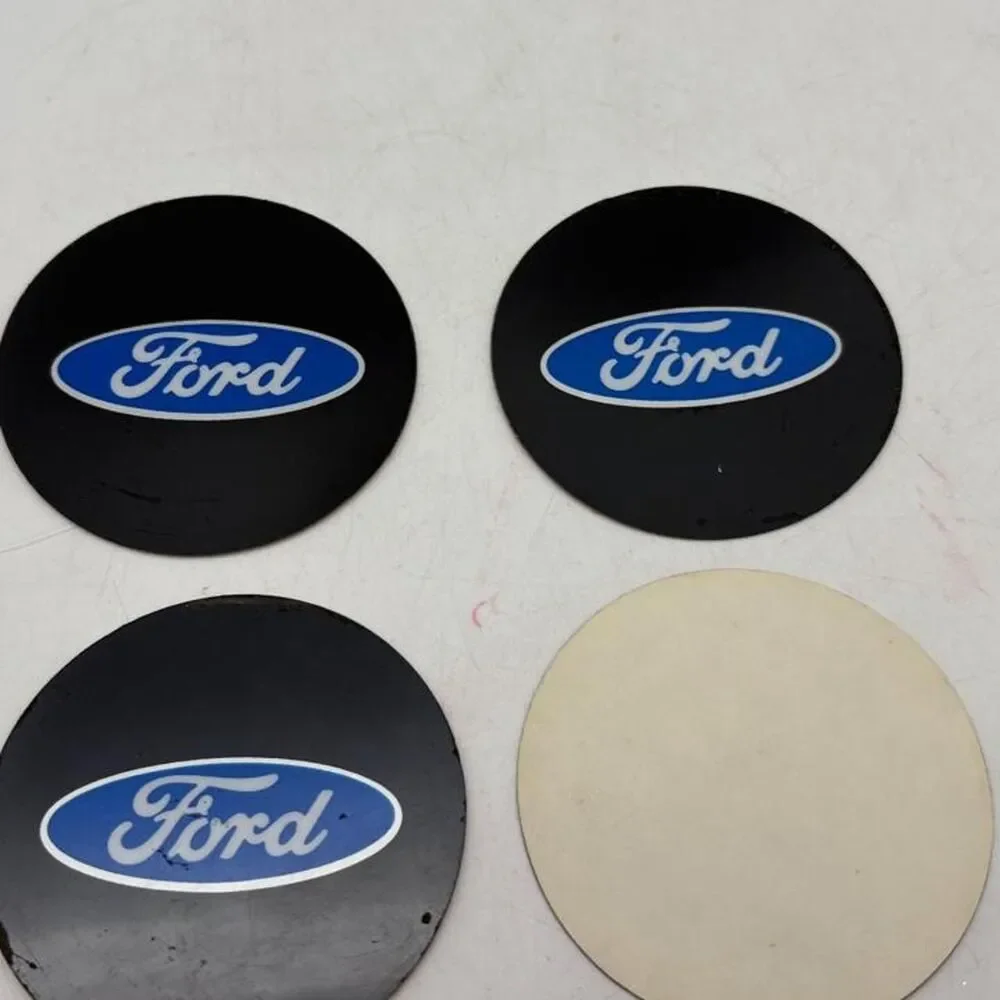 Ford center caps with blue oval logo